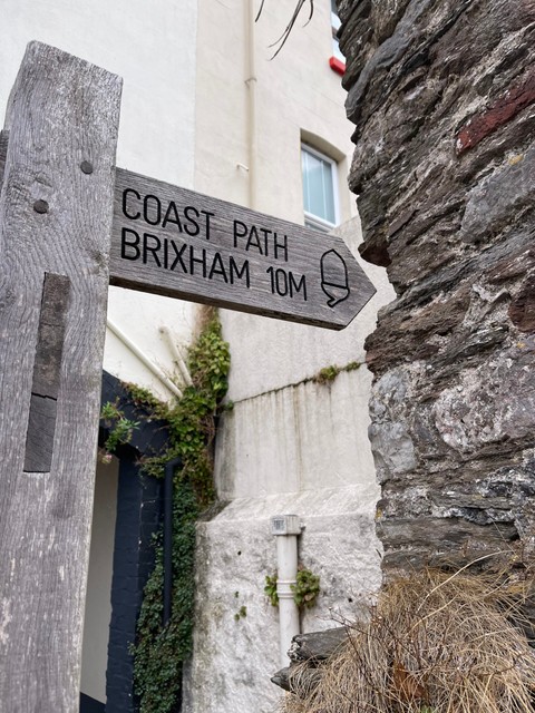 Wooden signs guide you along the length of the South West Coast Path - look out for the acorn denoting a national trail
