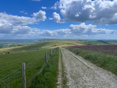 Looking back over the South Downs, with Chanctonbury Ring just visible in the distance