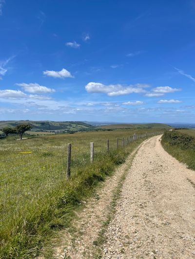 Heading along the chalky path towards Clayton windmills